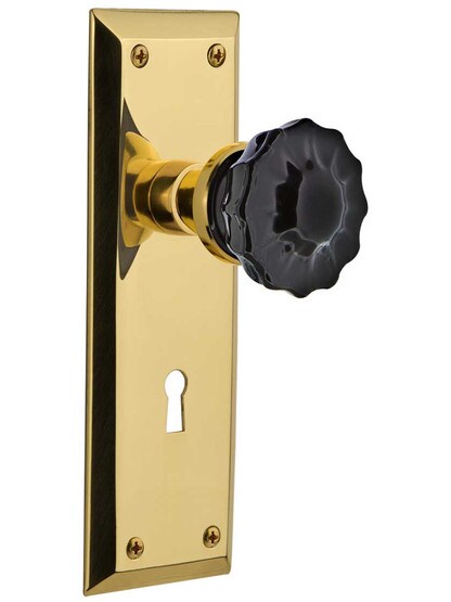 New York Door Set with Keyhole and Colored Fluted Crystal Glass Knobs Black in Un-Lacquered Brass.